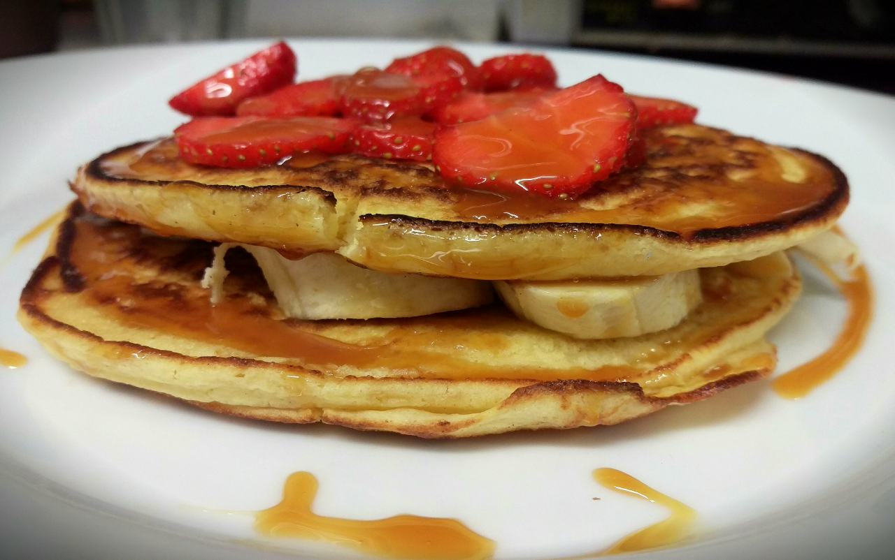 Pancake with banana and strawberries
